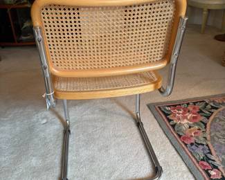 C125 - $200. Breuer Cane Cesca Cantilever Chairs. set of 4 with rounded fronts. 18" seat height, 31" total height. Very good overall condition - 1 seat has minor breakage - 1 chair has scratches on the front.