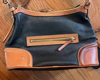 C12 - $75. Vintage Y2K Dooney & Bourke Black Pebble Leather Hobo Bag / Purse with matching wristlet. Measures 13" x 5.5" x 9".