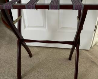 C47 - $20. Thomas Pacconi Classics Mahogany Finish Luggage Rack. Overall very good condition - has minor knicks in the wood. Measures 22" x 12" x 14" tall.