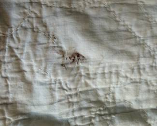 C71 - $50. Antique Quilt - probably a cutter. Measures 84" x 99". Has holes and wear throughout.