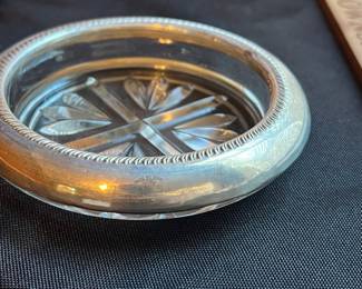 C105 - $35. Set of 6 Sterling Rimmed Coasters.