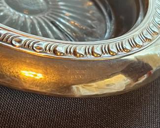C106 - $25. Set of 4 Sterling Coasters.