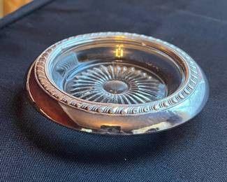 C106 - $25. Set of 4 Sterling Coasters.