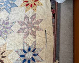 C71 - $50. Antique Quilt - probably a cutter. Measures 84" x 99". Has holes and wear throughout.