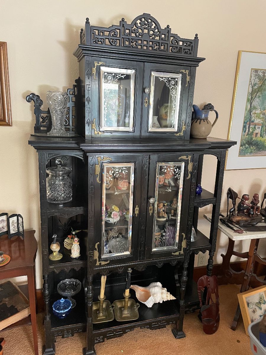 This antique hutch is Victorian with an Asian flare.