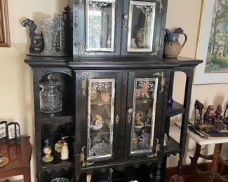 This antique hutch is Victorian with an Asian flare.