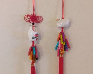 Pair of Ceramic Animal Ornaments with Chinese Knots and Tassels