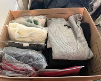 Brand New sweaters in package