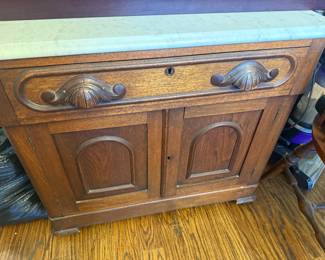 antique cabinet with marble top