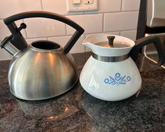 Silver teapot,  $8.  Corningware Blue Cornflower tea pot, $10