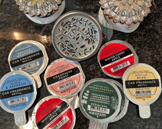 Car Fragrance holders and car fragrance refills,  $7