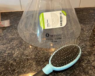 Dog cone and dog brush,  $3 each