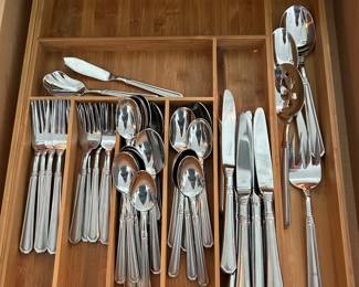 12 place settings flatware,  $35.  Expandable bamboo drawer divider, $8