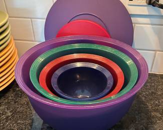 Set of 4 plastic bowls with lids (green lid missing),  $9