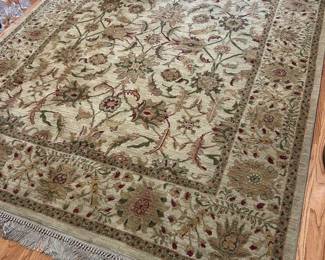 Beige floral decorative area rug,  11'3" x 7'9",  $150