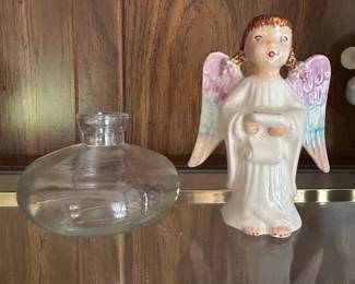 Small glass vase,  $3.  Ceramic singing angel,  $4