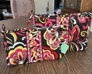 Vera Bradley "Pucinni" patterned cosmetic bags, Small (NEW),  $12.  Larger cosmetic bag,  $14