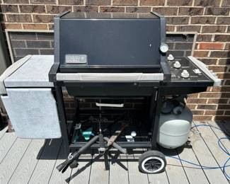 Weber propane grill w/ grill cover,  $100