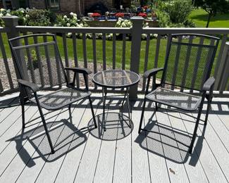 Outdoor metal chairs (2) and small table,  $45
