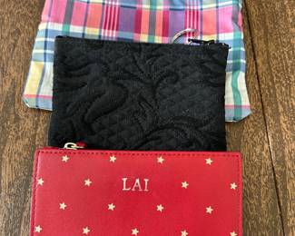 Le Sport plaid zipped pocket bag,  $4.  Black coin purse,  $4, LAI red wallet,  $9