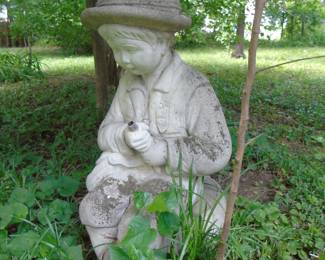 concrete figure boy fishing