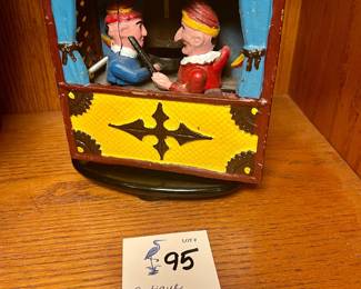 Antique Punch and Jody Cast Iron Coin Bank
