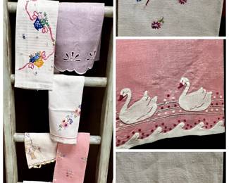Collection of handmade needlepoint tea towels