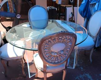 Awesome glass top kitchen table and shell chairs