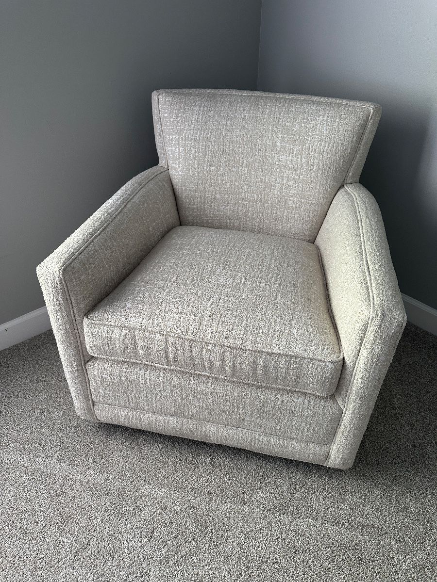 Upholstered swivel rocking chair 31"W x 32"D x 32"H with a 19" seat height - $400