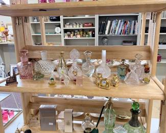 Perfume bottles and Lalique at the top.