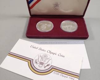 192 Lot 35 1983 and 1984 U.S. Mint Olympic proof commemorative silver dollars