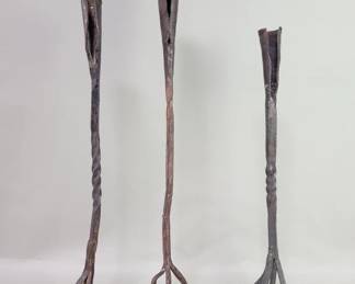189 Lot 566 Three 19thcentury handforged wrought iron branding ironscandlesticks