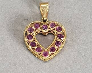 014 Lot 32 18k gold filigree heart pendant with pink rubies