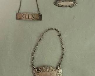 Lot # : 68 - Three sterling silver bottle tags