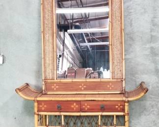 065 Lot 721 Asianstyle bamboo, wood, and rattan console table with mirror
