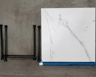 080 Lot 241 Marble coffee table with metal base