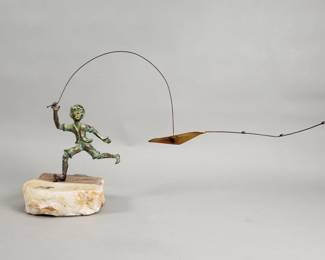 076 Lot 123 Vintage Bijan brass and onyx Boy Flying a Kite sculpture