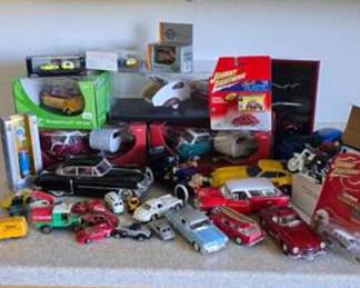 Lot #218 From Microcars to Muscle Cars – The Ultimate Garage Shelf Collection!