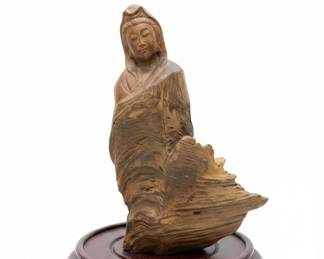 Carved Wood Figurine on Display Stand