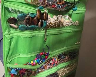 Assorted Beaded Necklaces and Bracelets in Hanging Organizer
