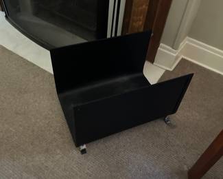 CRATE AND BARREL iron firewood holder. $85