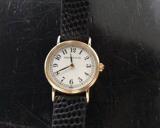 Tiffany 14k gold wrist watch running $875