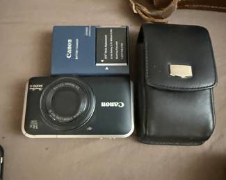 Canon PowerShot SX210 IS 14.1MP Digital Camera - Black- $85