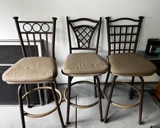 THREE SWIVEL STOOLS
