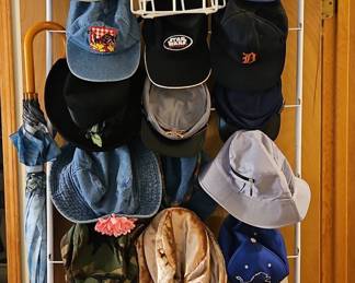 Assorted Hats and Umbrella