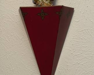 Metal Chinoiserie inspired wall sconce shelf with dangling finial charm