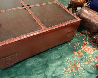 This gorgeous coffee table is hidden storage within each square! Perfect!