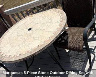 Marquesas Piece Stone Outdoor Dining Set with Wicker Chairs
