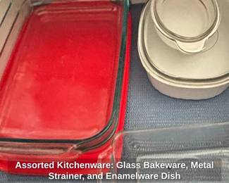 Assorted Kitchenware Glass Bakeware, Metal Strainer, and Enamelware Dish second image