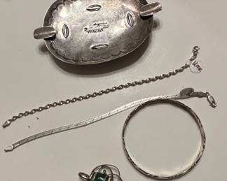 Native American Sterling Silver Ashtray, Sterling Silver Bracelets, and Sterling Silver Pendant